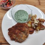 Pork neck schnitzel. Schweinenackenschnitzel.